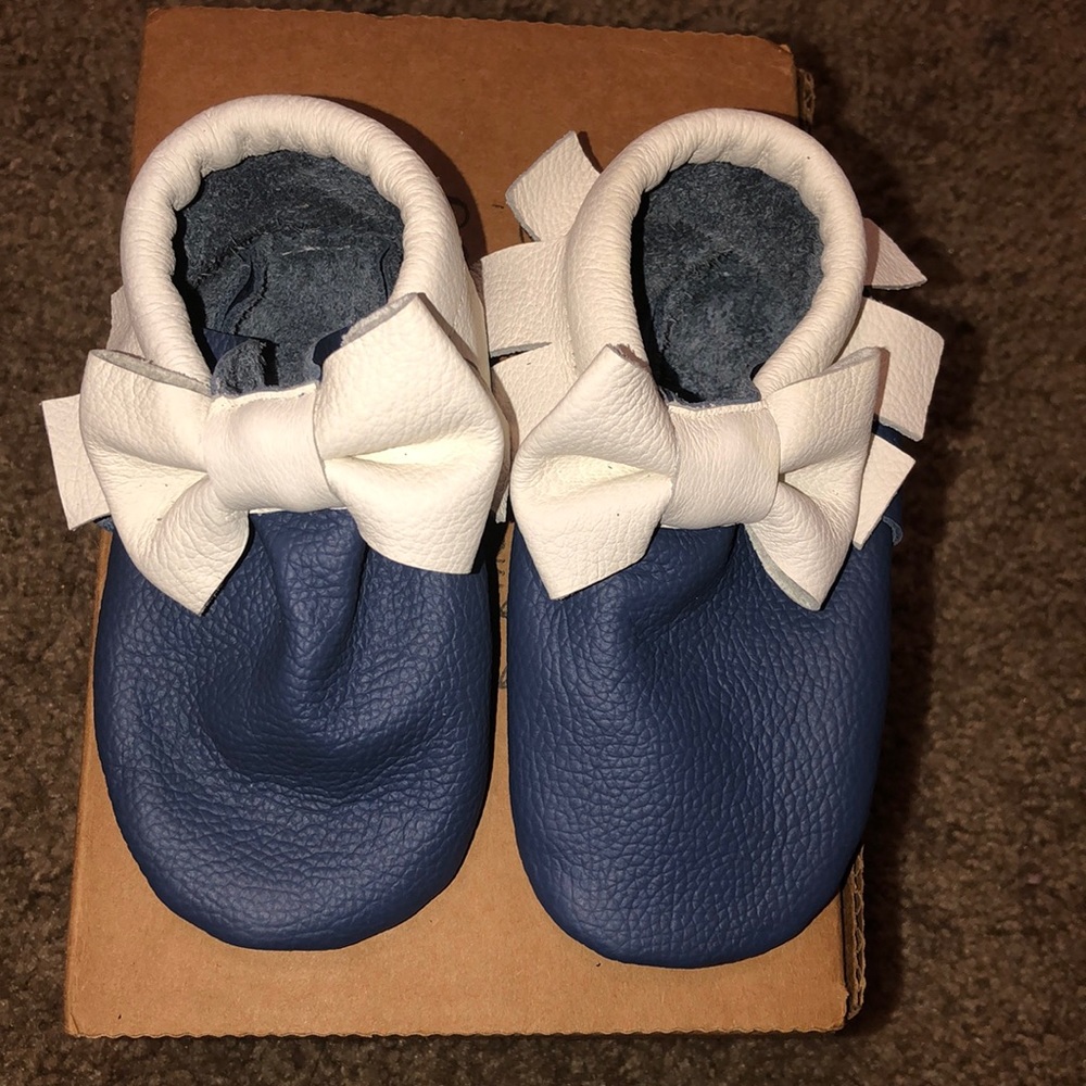 Never worn Authentic leather baby Moccasins